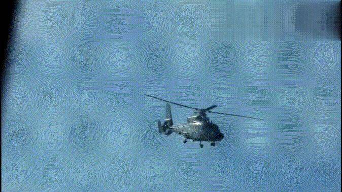 极限三米!黄岩岛中菲空中对峙!武直9强势碾压,菲记者吓得尖叫